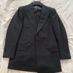 Black herringbone suit